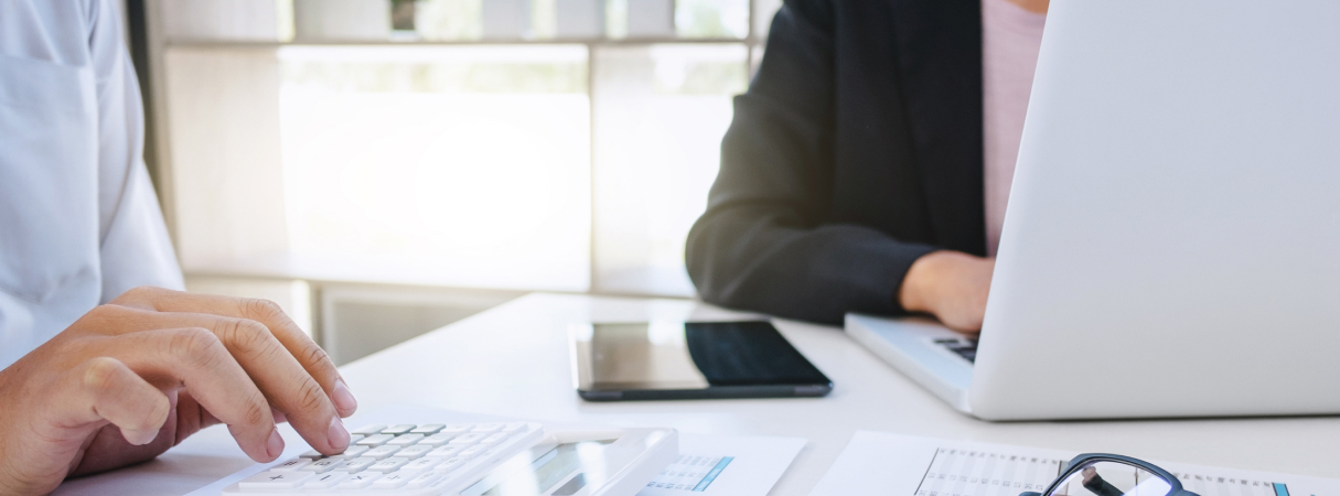 Employees working on laptops at Sobeys office.
